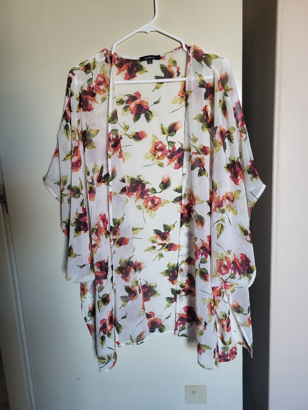White floral semi sheer boho shoulder cover with red, pink, and green flowers